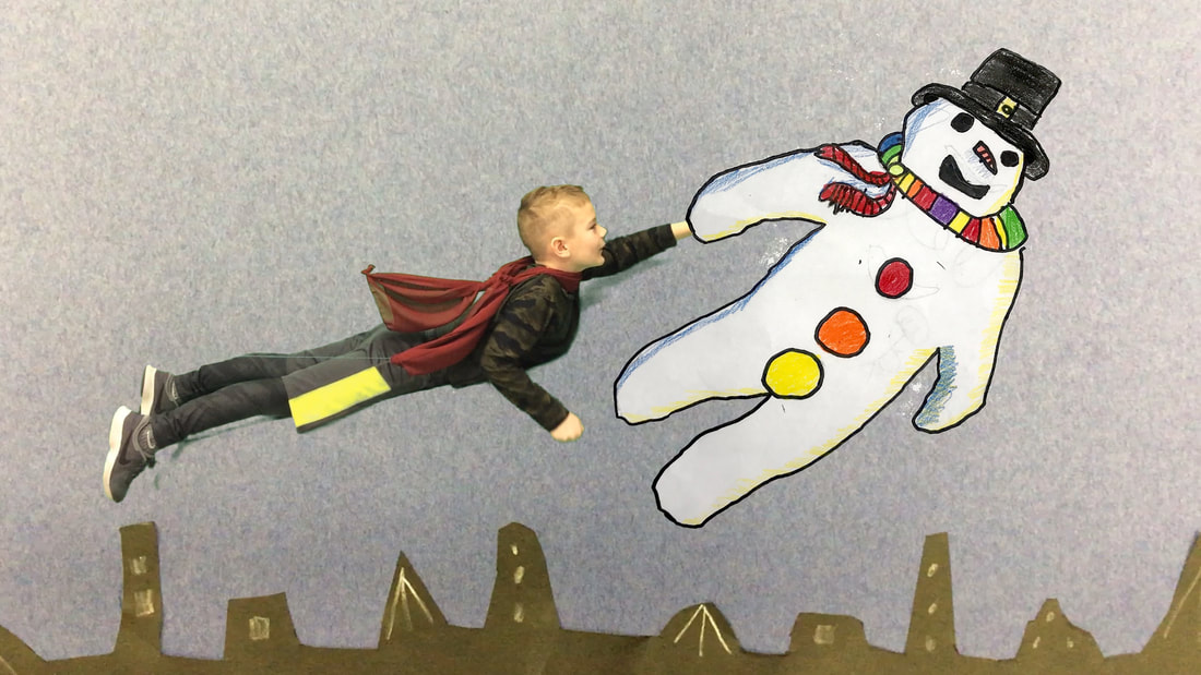 Photo of a young boy flying with a decorated snowman in the style of Raymond Briggs.